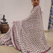 Elegant linen saree with zari border