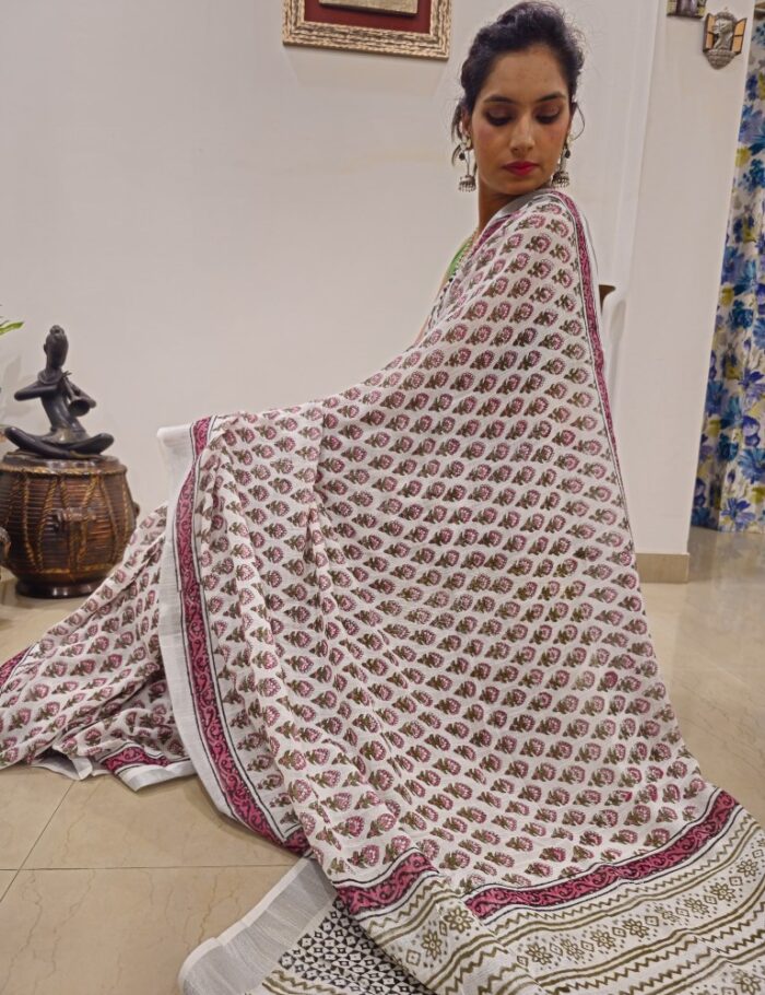 Elegant linen saree with zari border
