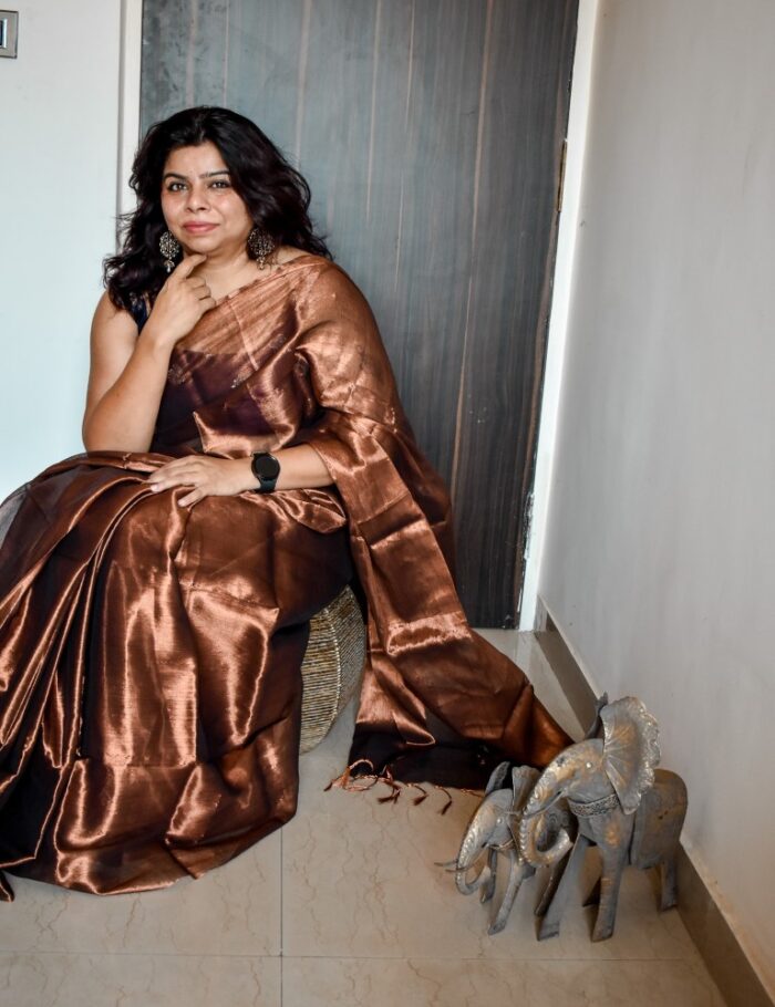 DSC_0444 Lustrous teaLustrous teal tissue silk sareel tissue silk saree