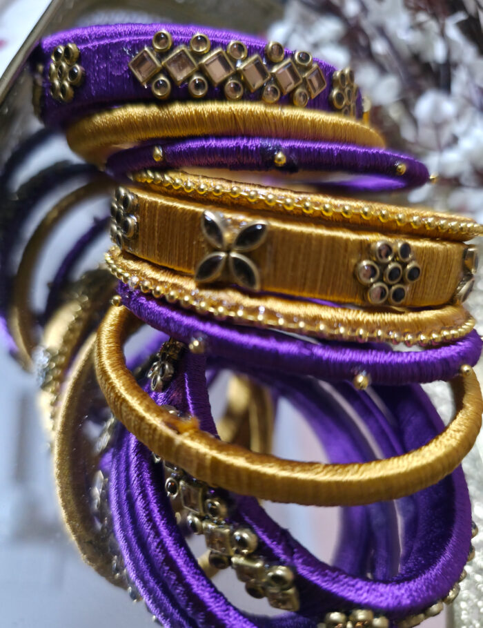 20250924_214706 Festive purple & gold silk-thread bangles with kundan stones