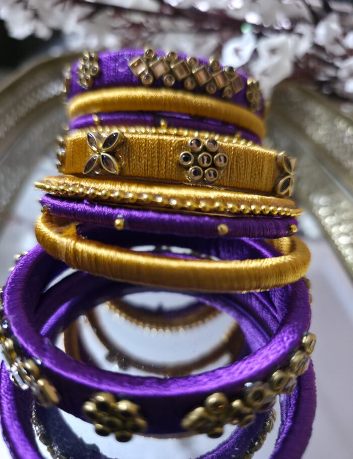 20250924_214810 Silk-wrapped kundan bangles in purple and gold