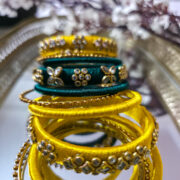 Vibrant yellow-teal bangles