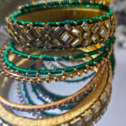 Silk-wrapped kundan bangles in green and gold