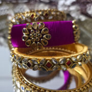Magenta-gold silk bangles