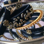 Elegant kundan bangles with black and beige silk thread