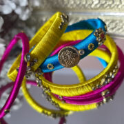 Handcrafted blue and yellow thread bangle set