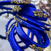 Silk-wrapped bangle set of six with kundan embellishment