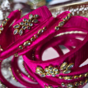 Six bright silk-thread kundan bangle pair stack