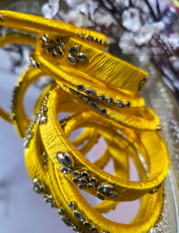 20251002_235445 Elegant six silk-thread kundan bangles for festive wear