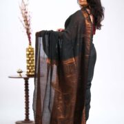 Deep-ink copper zari saree