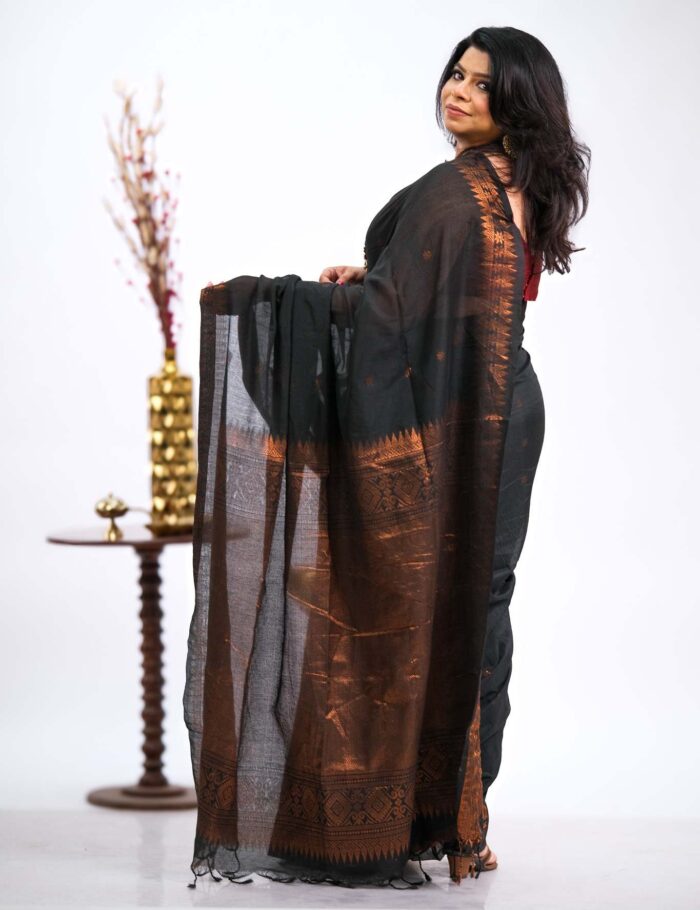 Deep-ink copper zari saree