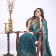 Teal khadi saree, shimmering zari edge