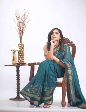 Teal cotton saree with zari border