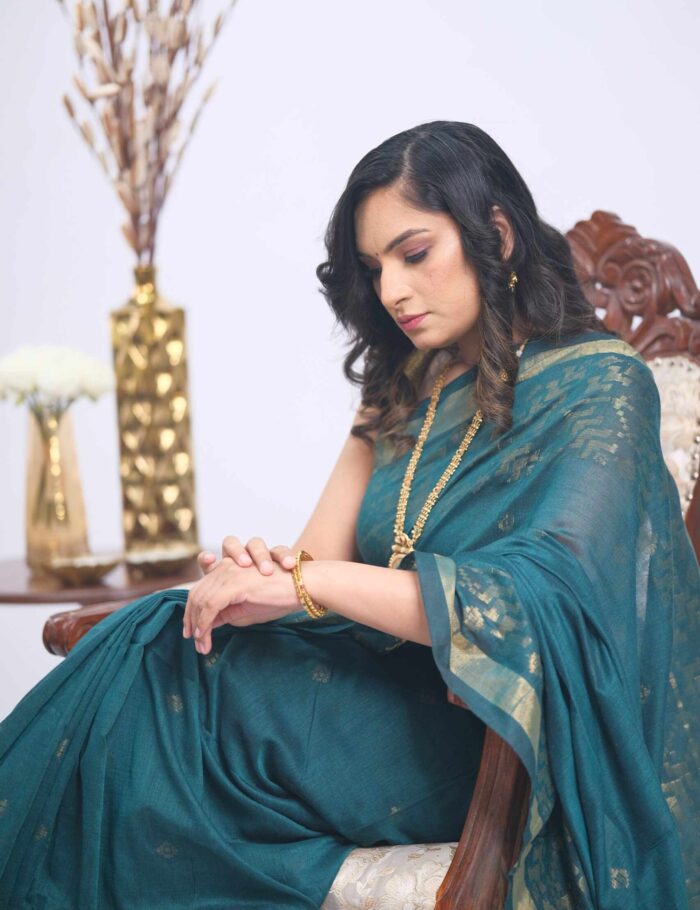 Teal khadi saree, traditional zari trim