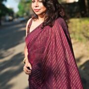 Soft khadi cotton saree in wine shade with metallic details