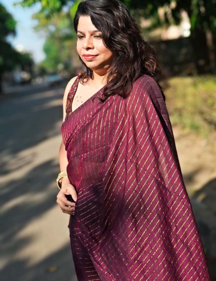 Soft khadi cotton saree in wine shade with metallic details