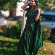 Khadi cotton saree in green hue adorned with zari lace