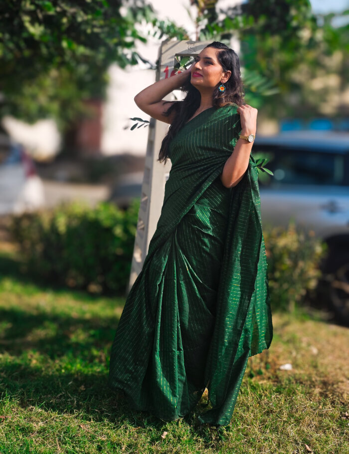 20250309_154823 Khadi cotton saree in green hue adorned with zari lace