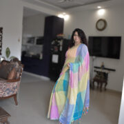 Light pastel linen saree with shimmering zari