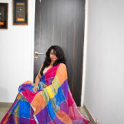 Pink Shatranj linen zari saree styled on a woman