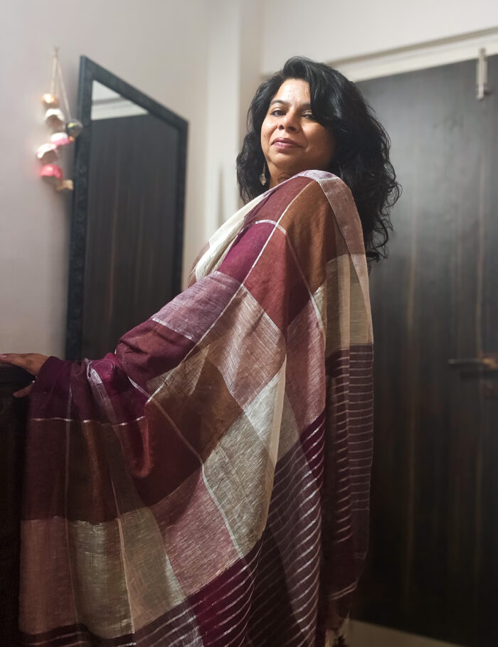Natural brown linen saree with detailed zari motif