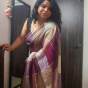 Brown linen saree detailed with delicate gold zari stripes