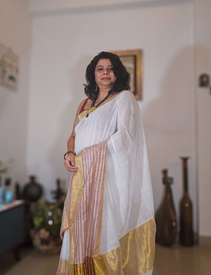 20250811_203427 Soft linen saree in mogra color trimmed with zari