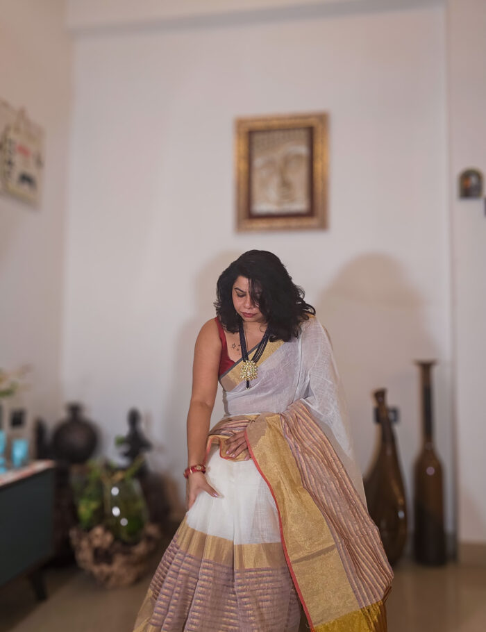 20250811_203459 Natural linen saree in mogra hue with zari finish