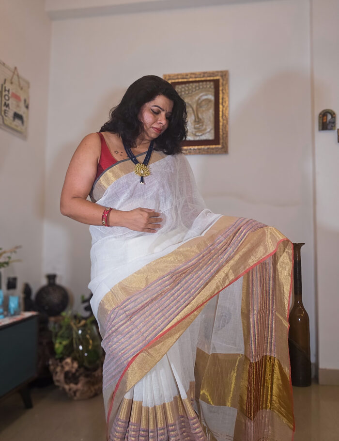 20250811_203605 Handwoven mogra linen saree featuring a zari border