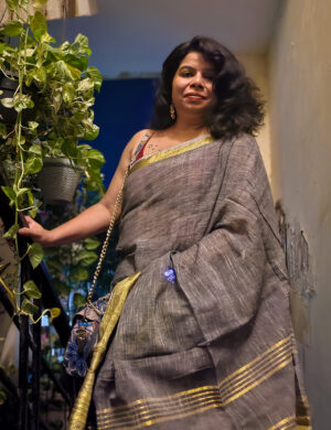 Linen saree in pastel saleti colour with fine zari border