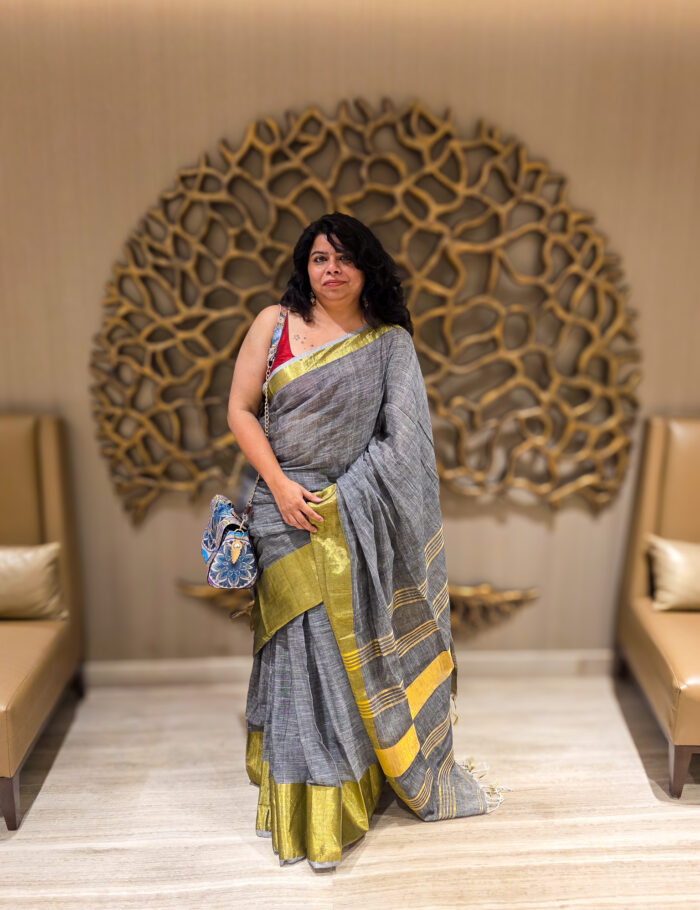 20250820_205631 Saleti linen saree styled in a modern drape, zari accent