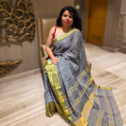 Elegant saleti linen saree highlighting metallic zari weave