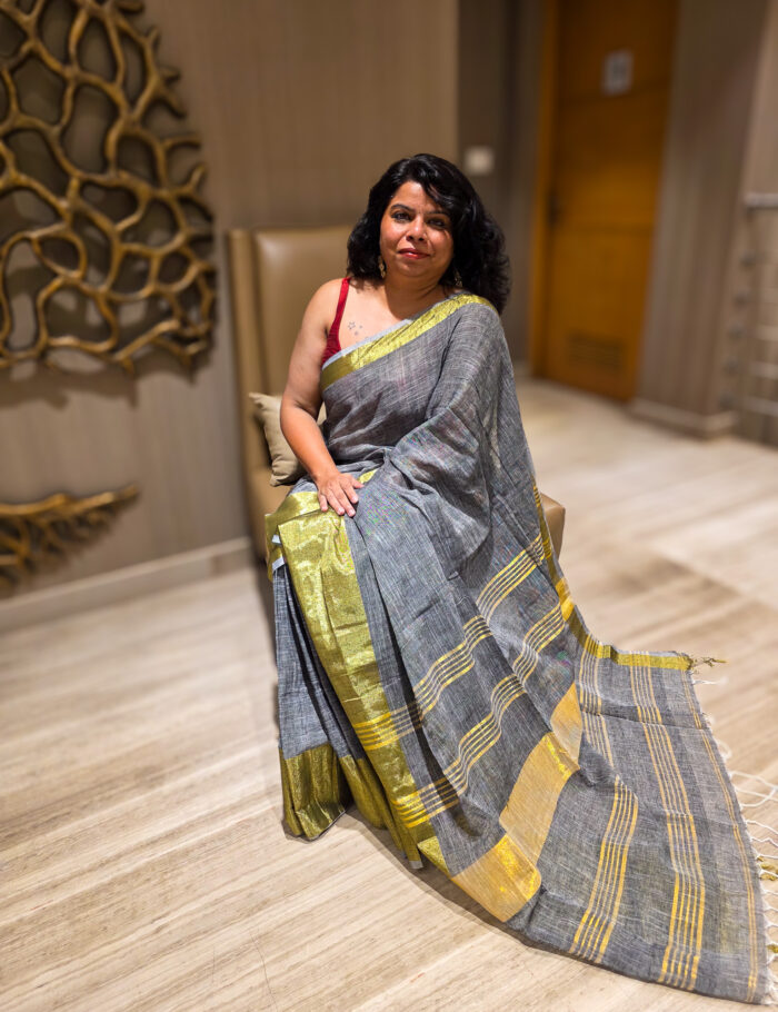 20250820_205712 Elegant saleti linen saree highlighting metallic zari weave