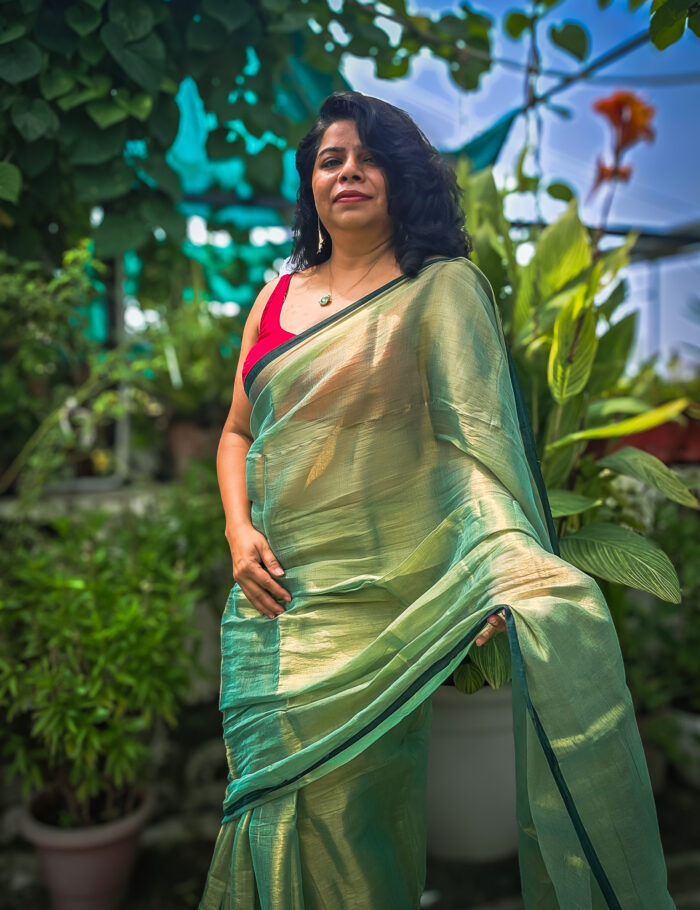 20250828_135703 Green draped saree with soft reflective shine