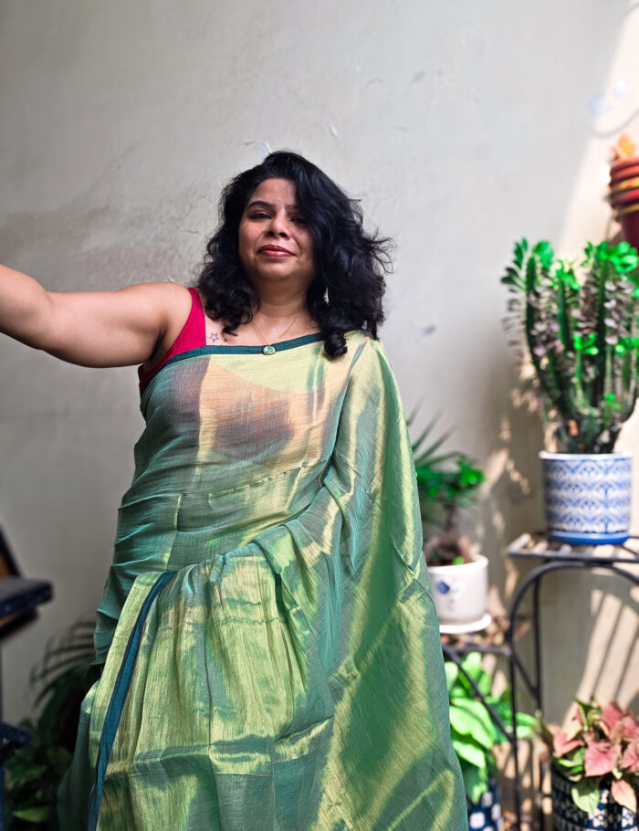 20250828_140445 Elegant green saree with soft metallic sheen