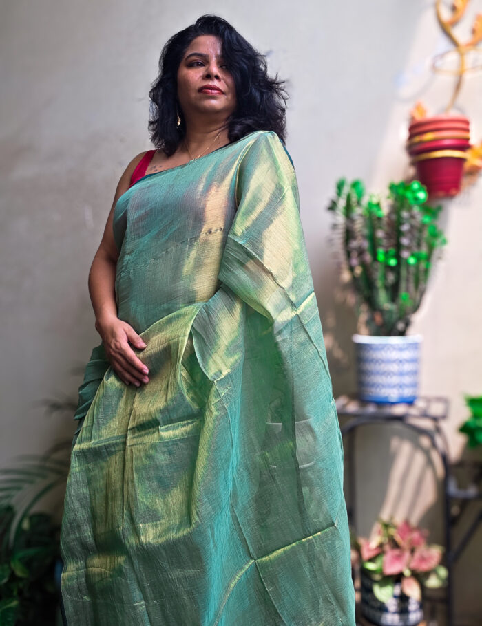 20250828_140540-2 Lightweight green silk saree with glossy finish