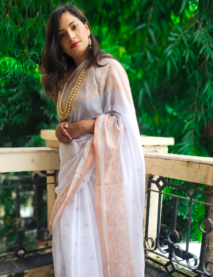 20250830_110129 Minimalist white cotton saree enhanced with zari border