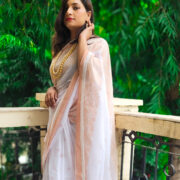 White khadi saree with fine zari detailing on the border