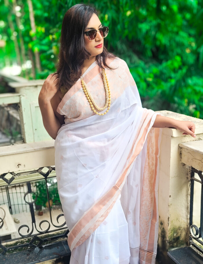 20250830_110630 White cotton handwoven saree with zari border accent