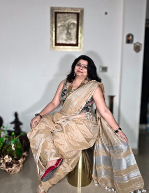Gold zari linen saree from Mznari