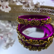 Two-piece magenta silk thread kundan bangle set