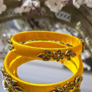 Yellow handcrafted silk bangles with kundan design