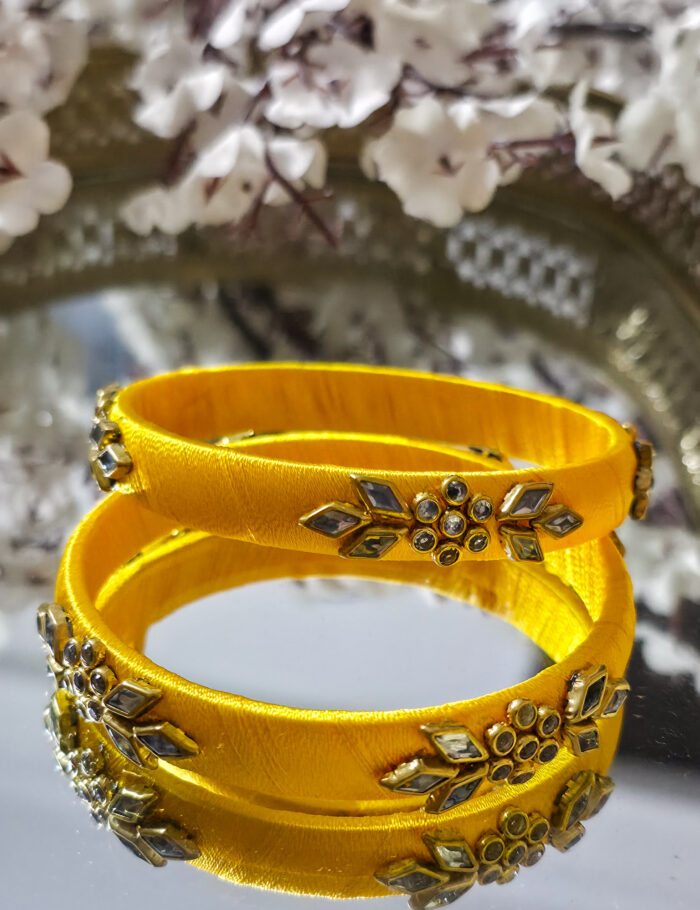 20250923_203924 Yellow kundan bangles wrapped in silk thread