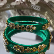 Traditional green-thread silk bangles with kundan stones