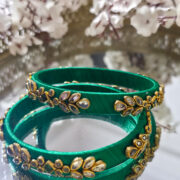 Handcrafted kundan bangles in leafy green silk thread