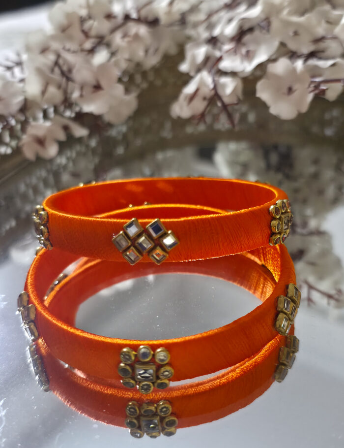 Orange silk thread kundan bangles pair