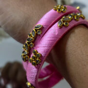 Pale pink silk-wrapped kundan bangles (2)