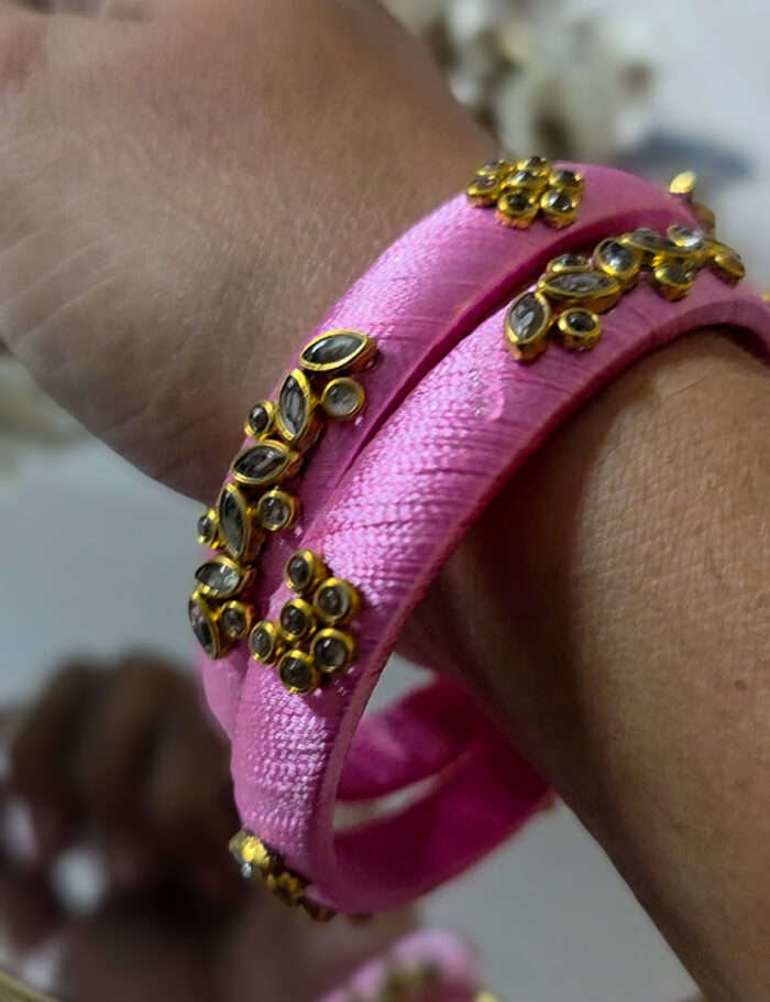 Pale pink silk-wrapped kundan bangles (2)