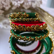 Silk thread kundan bangles in green and red