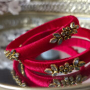 Red silk-thread bangles with kundan floral design